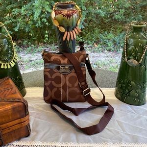Small coach crossbody bag.